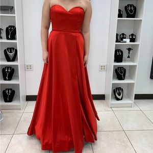 Jovani red prom dress size 12. Brand new. Never worn.